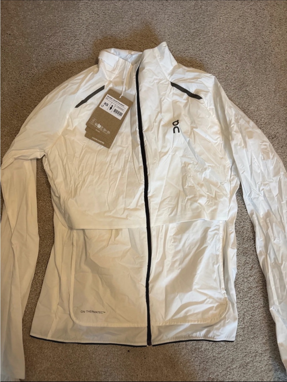On Running weather  White Women's Running Jacket - On Running